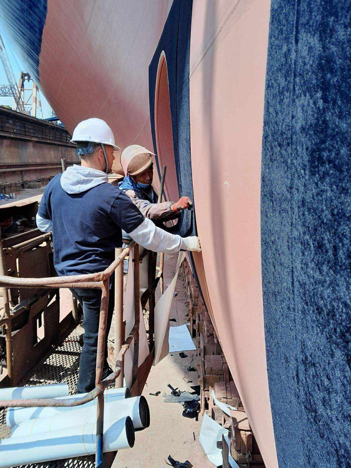 Finsulate antifouling wrap on yacht hull as bottom paint alternative
